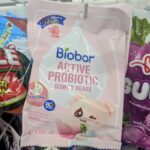 How Many 7-Elevens are in Thailand? (2026 Stats & Facts) A pink bag of Biobor Active Probiotic Gummy Bears in Peach flavor from 7-Eleven Thailand.