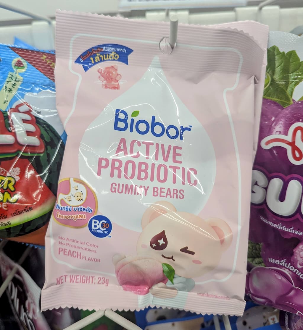 A pink bag of Biobor Active Probiotic Gummy Bears in Peach flavor from 7-Eleven Thailand.