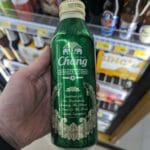 A cold bottle of Chang Unpasteurized lager beer from 7-Eleven Thailand.