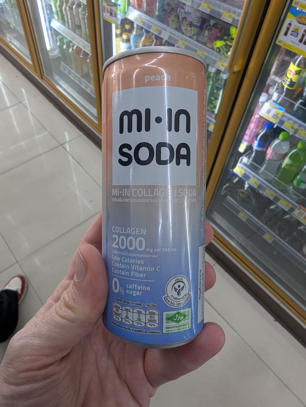 A can of Mi-In Collagen Soda Peach flavor from 7-Eleven Thailand.