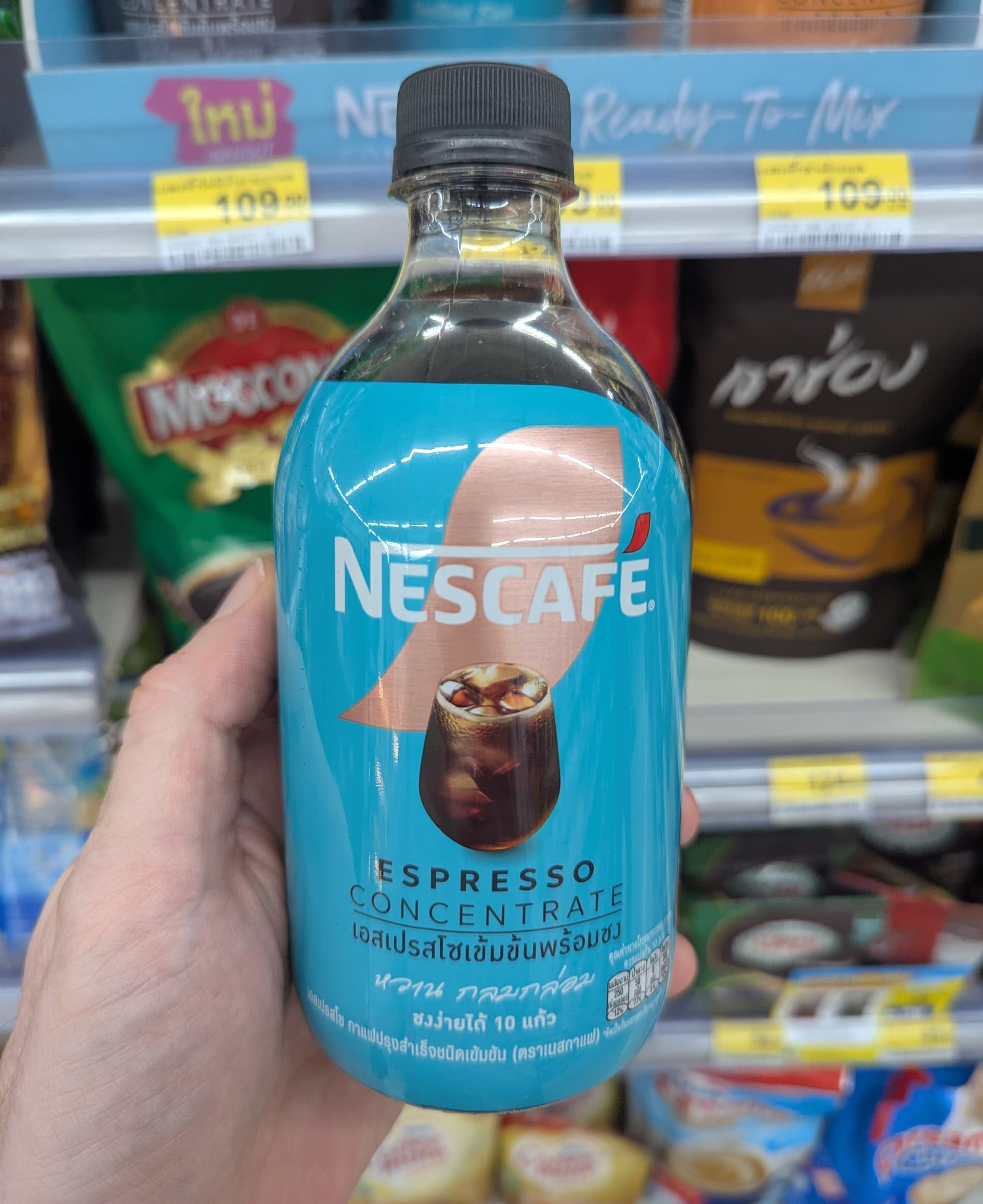 A bottle of Nescafé Espresso Concentrate Sweet Roast from a Thai 7-Eleven.