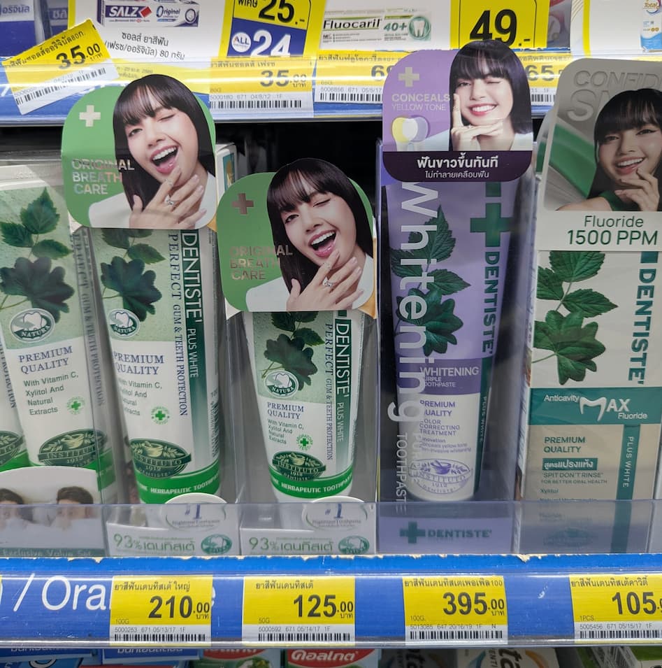 A tube of Dentiste' Plus White Nighttime Toothpaste featuring Lisa from BLACKPINK, from 7-Eleven Thailand.