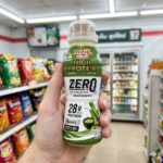 Propoliz Mouth Spray 3D: The Ultimate Sore Throat Assassin in Thailand A bottle of Meiji High Protein Zero Sucrose Matcha flavor from a 7-Eleven in Thailand.