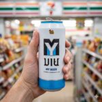 A silver 490cc can of MY Beer from a 7-Eleven in Thailand.