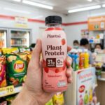 A bottle of Plantaé Plant Protein Strawberry flavor with 31g protein.