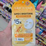 Ezygo Hot Dog with Meatballs and Cheese: A Satisfying Italian-Style Microwave Bit A hand holding a yellow sachet of Srichand In-Skin Super C Brightening Ampoule Mask inside a 7-Eleven store in Thailand.